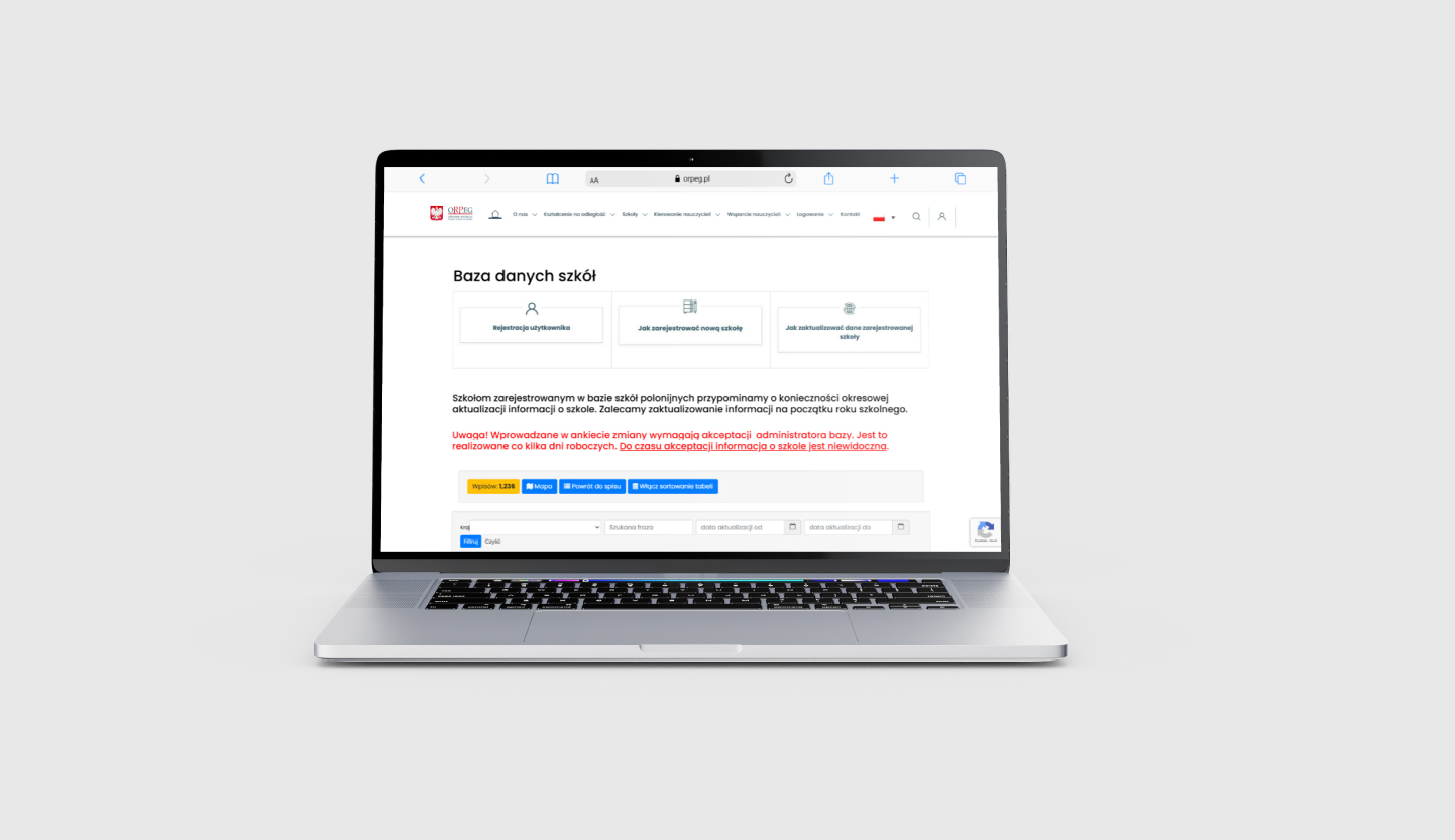 Mockup laptopa prezentujący stronę główną portalu Baza organizacji i instytucji polonijnych za granicą